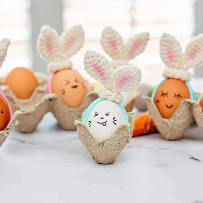 Crochet easter bunny eggs in egg cartons.