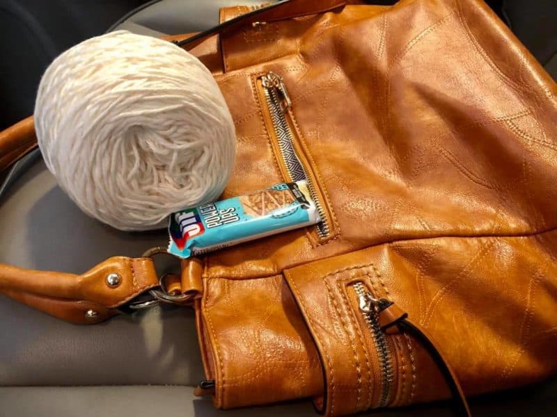 purse with yarn in car