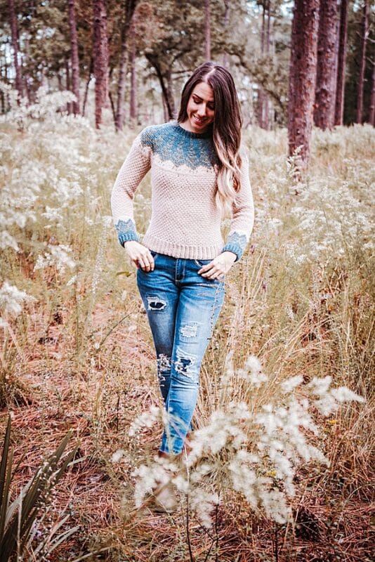 Crochet Colorwork Sweater on Woman in a Field