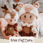 A person holding an adorable amigurumi crochet deer.