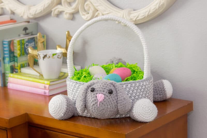 A Bunny Easter Basket with a stuffed animal and eggs.