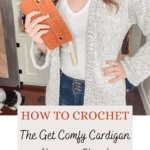 A person wearing a gray crocheted cardigan holds an orange crochet hook case. Text below reads: "How to Crochet the Get Comfy Crochet Cardigan Pattern (Long or Short). Free Pattern + Video Tutorial.