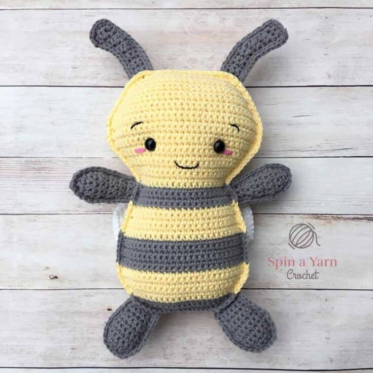 A crocheted bee stuffed animal.
