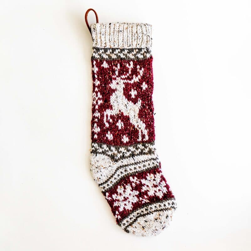 A prancing deer crochet stocking.