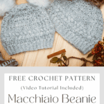 Two light gray crocheted beanies with pom-poms rest on a wooden surface, surrounded by autumn-themed decorations. Text below promotes a free Crochet Beanie Pattern for the "Macchiaio Beanie.