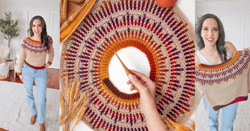 A woman wears and holds a colorful knitted sweater. A hand holds a crochet hook over the sweater’s circular yoke. The scene includes wooden decorations and a plant.