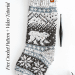 Crocheted stocking with a polar bear design, crochet hook beside it. Text reads: "Polar Bear Stocking," "Free Crochet Pattern + Video Tutorial," "brianakdesigns.com.