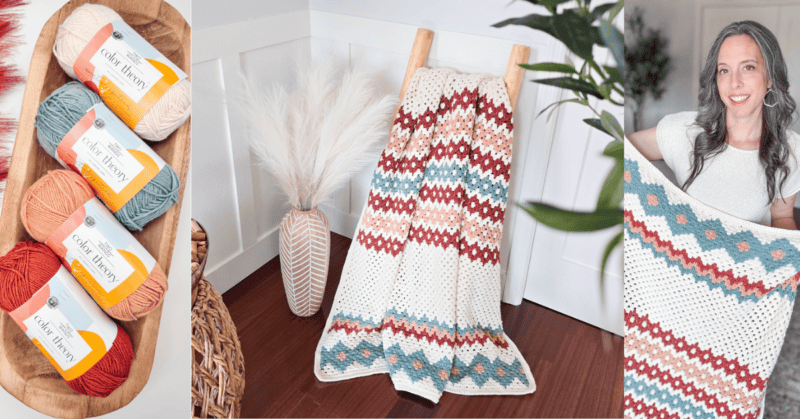 Yarn balls in a tray beside a woven blanket with gemstone hues and a diamond pattern, hung on a ladder; a person holds the crochet blanket, smiling.