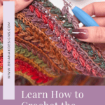 Close-up of hands crocheting a colorful textured fabric with a blue crochet hook, demonstrating how to crochet the wheat stitch and promoting a free step-by-step wheat stitch tutorial.