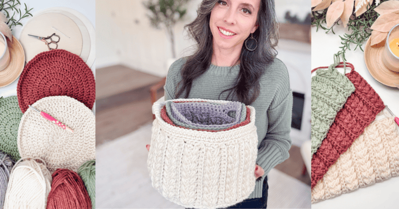 Person holding a cream-colored knitted basket with various colored yarns. To the left, crochet materials are displayed on a table.