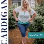 Woman wearing a white crocheted cardigan, teal top, and jeans stands outdoors. Text reads: “Free Crochet Pattern – Lollipop Summer Cardigan. Sizes XS–5X. Includes video tutorial.”.