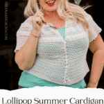 A smiling woman in a white crocheted cardigan over a green top, holding sunglasses and standing outdoors. Discover the Free Crochet Pattern - Lollipop Summer Cardigan, available in sizes XS-5X.