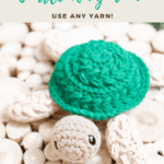 Crocheted turtle amigurumi with green shell and beige limbs and head, displayed on white wooden rounds. Text advertises a free pattern and video tutorial from brianakdesigns.com.