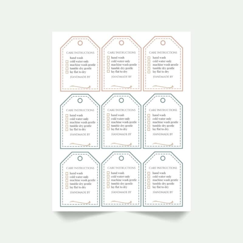 A sheet with nine printable care instruction tags, each listing washing guidelines with checkboxes and a space for "Handmade by" at the bottom. Tags are outlined in pink, blue, and gray.