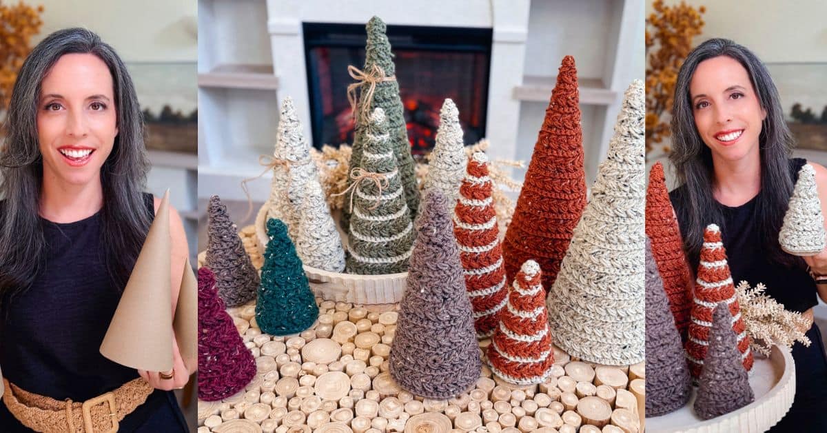 A woman displays handmade Wheat Stitch Crochet Trees—textured Christmas decorations crafted from yarn and rope in various colors and sizes, arranged on a wooden surface.