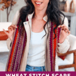 Woman standing indoors holding a colorful crocheted scarf; text reads "Wheat Stitch Scarf. Free Crochet Pattern + Video Tutorial. www.brianakdesigns.com.