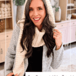 Woman wearing a cream-colored, hooded knit scarf, smiling indoors. Text reads: “Wheat Stitch™ crochet hooded scarf pattern. Free Pattern + Video Tutorial. www.brianakdesigns.com.”.