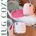 Three ceramic mugs with crocheted cozies in green, pink, and white rest on a light fabric. One hand holds the white mug. "MUG COZY" and "Wheat Stitch" text appear, inspired by the Wheat Stitch hotpad crochet pattern.