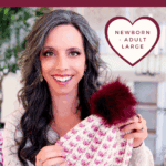 Woman holding a crocheted hat with a pom-pom, promoting a free crochet pattern and video tutorial for the Wheat Stitch Sweetheart Hat in multiple sizes.