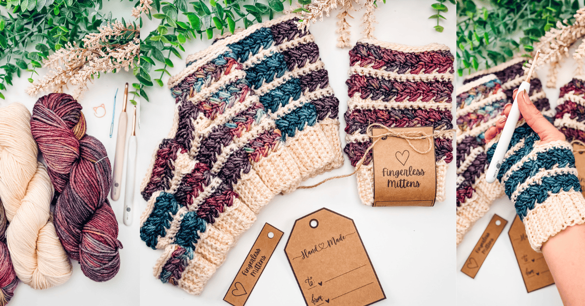 Yarn, crochet hooks, and finished crocheted fingerless mittens are displayed with handmade tags on a white surface, surrounded by green and dried plants.