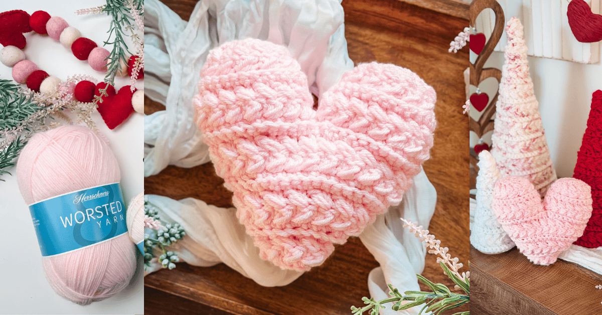 A ball of pink yarn, a pink crocheted heart, and Valentine-themed crochet decorations including hearts and cone-shaped trees are displayed together.