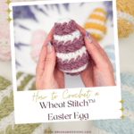 Hands holding a crocheted Easter egg with white and purple stripes; other crocheted eggs are displayed in the background. Text advertises a free pattern and video tutorial.