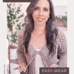 Woman wearing a Circle Leaf Lace Crochet Cardigan pattern with a V-neck and tie front, standing indoors with a plant and furniture in the background. Text reads "V-Neck with a Tie Front" and "Easy-Wear.