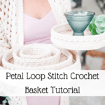 A person in a pink dress and white crochet cardigan holds two crochet baskets. Text reads: "Petal Loop Stitch Crochet Basket Tutorial." A green glass bowl and plant rest on the baskets, perfect for your next crochet nesting trays pattern project.