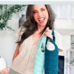 A woman smiles while holding two crocheted water bottle holders, one light blue and one dark teal, with a water bottle inside each. Text above advertises a free crochet pattern.