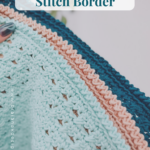 A hand holds a light blue crocheted blanket with a textured pattern and a zig-zag slip stitch border in blue, pink, and dark blue yarn.