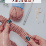 Two hands hold a crochet strap in progress, with a ball of pink yarn, crochet hook, scissors, and stitch marker on a white surface. Text reads, "Tunisian Crochet Simple Stitch Strap.