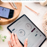 Tablet displaying a crochet tracking app and free stitch counter, surrounded by a notebook, pen, pink crochet piece, and plant. A hand with rings interacts with the tablet screen.