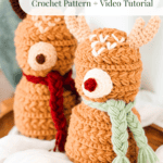 Two crocheted reindeer figures with scarves, featuring large eyes and antlers, are displayed on a table. Text reads, “Wheat Stitch Reindeer Crochet Pattern + Video Tutorial.”.