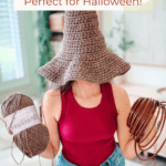 A person wearing a brown crochet witch hat pattern, holding a skein of yarn and brown trim, with text reading: “How to Crochet a Wheat Stitch Witch Hat Perfect for Halloween!”.